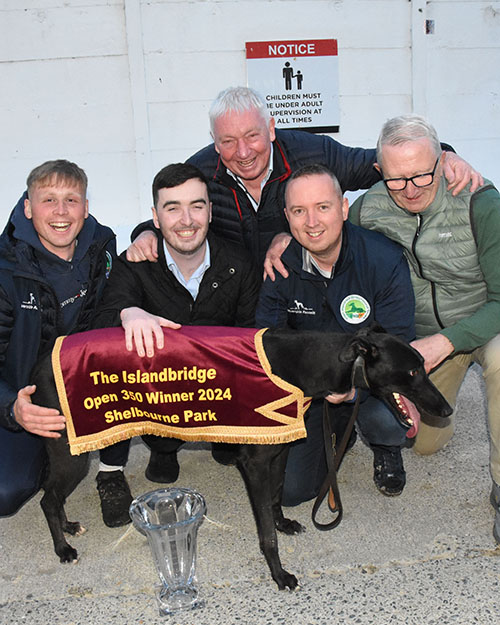 The Pillar Syndicate Jack & Larry O Shea Noel and David Byrne Pictured with "Ballinakill alf " and his Handler Timothy Holland after his victory in the Final of the 2024 Islandbridge Open 350 Final at Shelbourne Park,Photo Imelda Grauer 