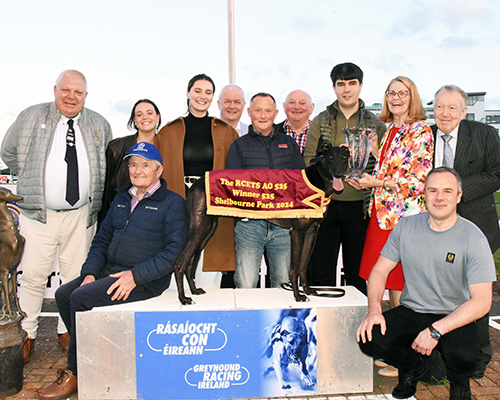 Conor Matthews Racing Support Officer Presents the trophy to Loraine Howard after " Miami King